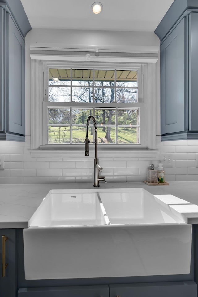 6112 Frontier Ct, Nashville, TN 37211 - room details featuring light countertops, recessed lighting, decorative backsplash, and a sink