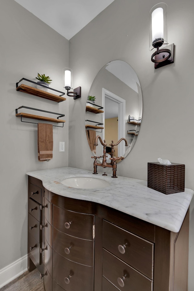 6112 Frontier Ct, Nashville, TN 37211 - bathroom with baseboards, vanity, and wood finished floors