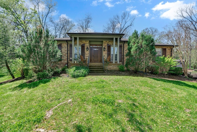 6112 Frontier Ct, Nashville, TN 37211 - view of front facade featuring covered porch, brick siding, and a front yard