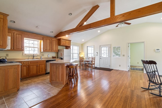 283 Dyestone Springs Rd, Hohenwald, TN 38462 - kitchen featuring stainless steel dishwasher, freestanding refrigerator, a kitchen island, light countertops, and recessed lighting