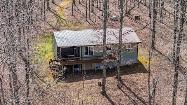 283 Dyestone Springs Rd, Hohenwald, TN 38462 - rear view of house featuring metal roof and a wooden deck