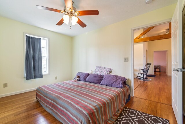 283 Dyestone Springs Rd, Hohenwald, TN 38462 - bedroom with wood-type flooring, baseboards, and ceiling fan