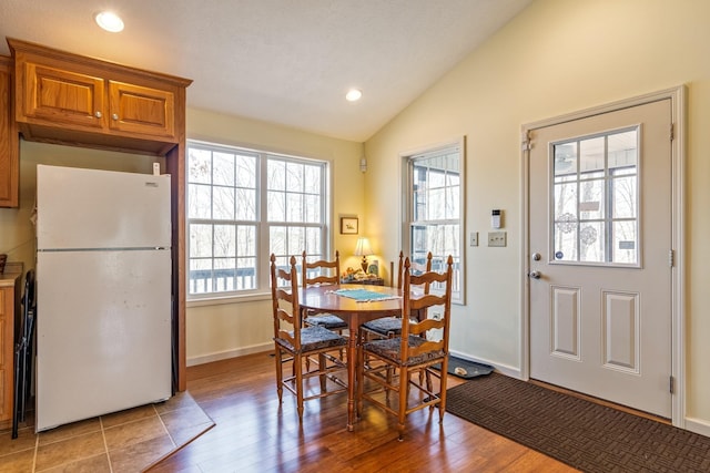 283 Dyestone Springs Rd, Hohenwald, TN 38462 - dining room featuring lofted ceiling, light wood-type flooring, recessed lighting, and baseboards