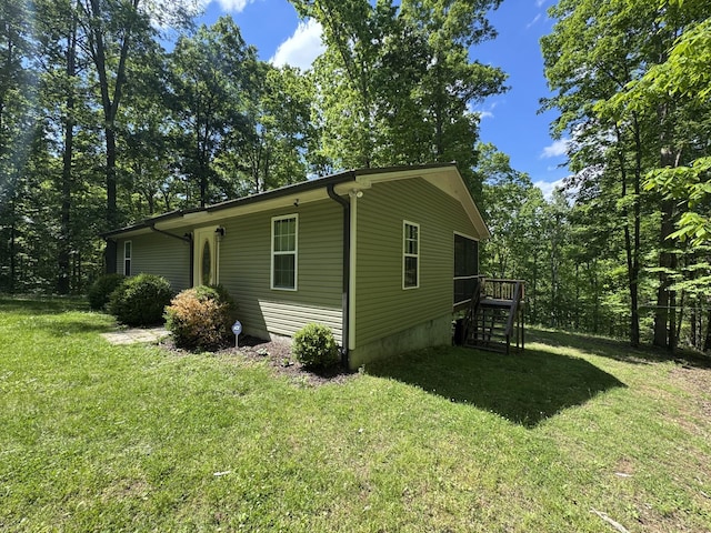 283 Dyestone Springs Rd, Hohenwald, TN 38462 - view of side of property featuring a lawn and stairs
