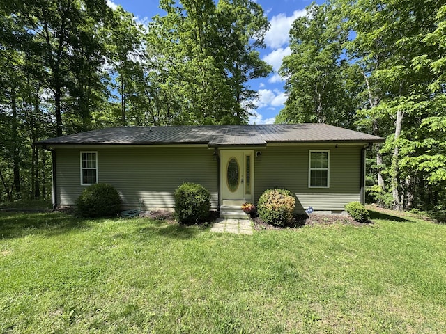 283 Dyestone Springs Rd, Hohenwald, TN 38462 - view of front of property with a front yard and metal roof
