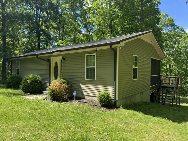 283 Dyestone Springs Rd, Hohenwald, TN 38462 - view of property exterior with a yard and stairs