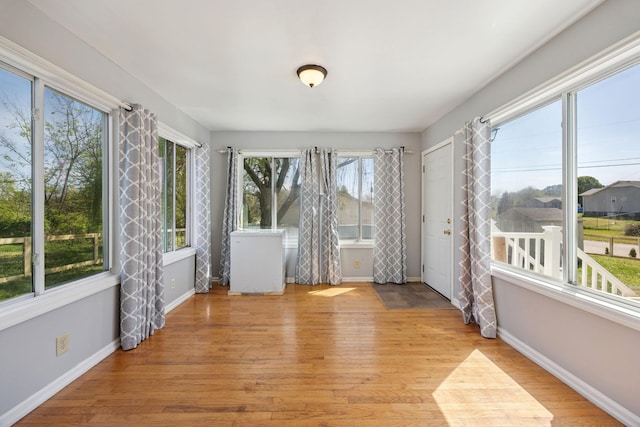 130 Gail St, Oak Grove, KY 42262 - unfurnished sunroom with baseboards and wood finished floors
