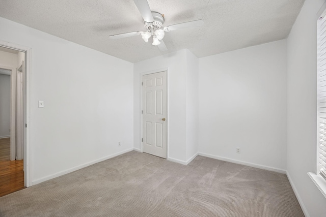 130 Gail St, Oak Grove, KY 42262 - carpeted spare room featuring a textured ceiling, baseboards, and ceiling fan