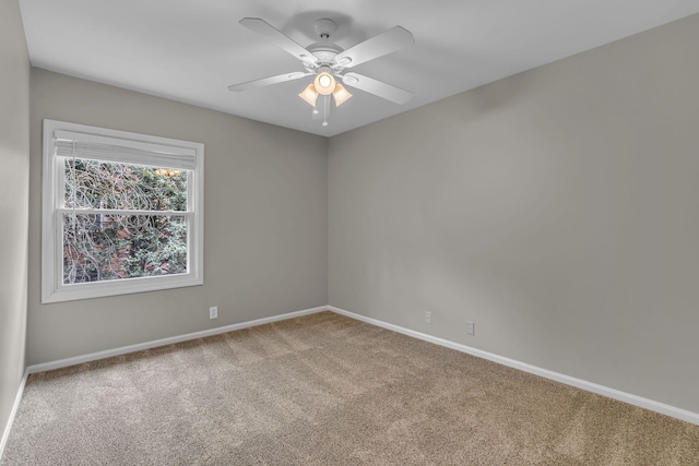 5025 Hillsboro Pike Unit 22D, Nashville, TN 37215 - carpeted spare room featuring baseboards and ceiling fan