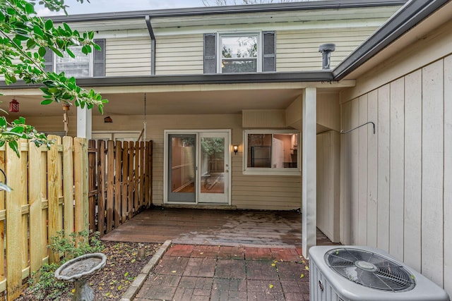 5025 Hillsboro Pike Unit 22D, Nashville, TN 37215 - doorway to property with central AC unit, a deck, and fence