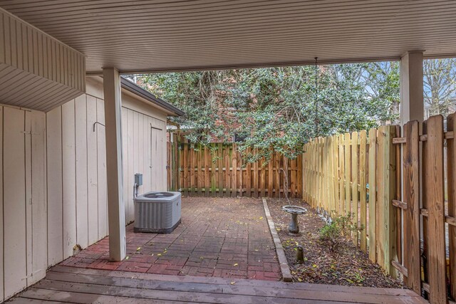 5025 Hillsboro Pike Unit 22D, Nashville, TN 37215 - view of patio / terrace featuring a fenced backyard and central air condition unit