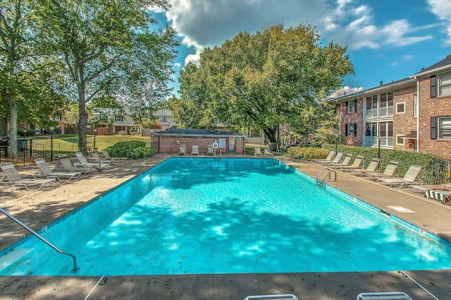 5025 Hillsboro Pike Unit 22D, Nashville, TN 37215 - pool with a patio area and fence
