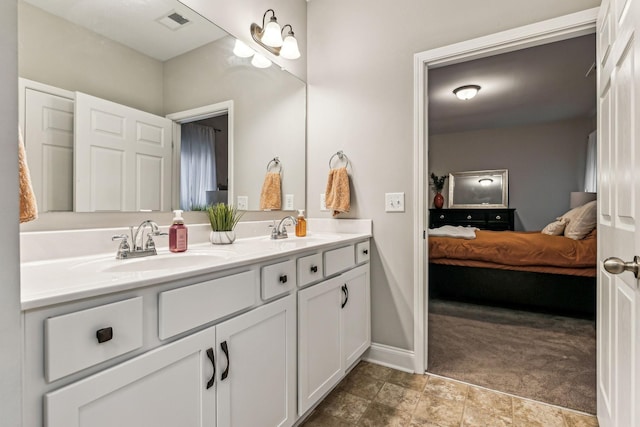 full bathroom featuring a sink, ensuite bathroom, double vanity, and visible vents