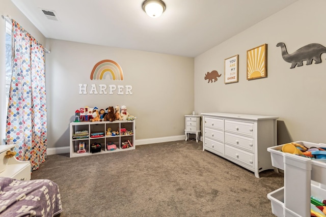 carpeted bedroom featuring visible vents and baseboards