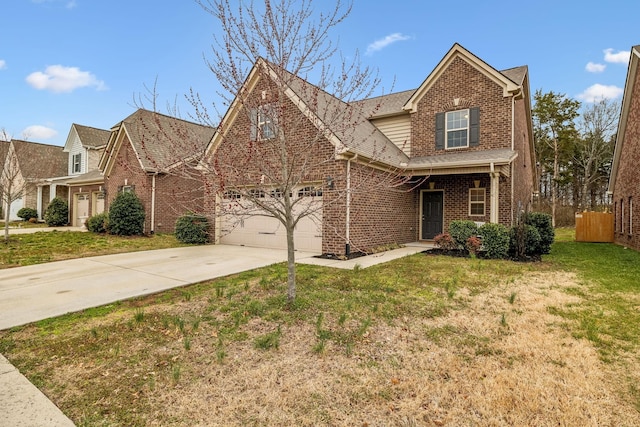 traditional home featuring a garage, fence, a front lawn, brick siding, and concrete driveway