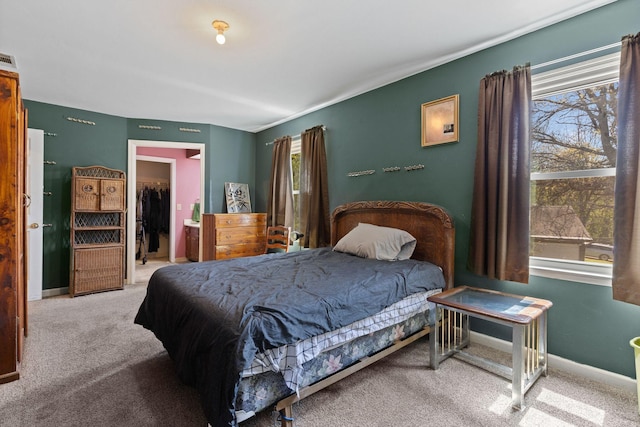 5412 Hunters Rdg, Nashville, TN 37211 - carpeted bedroom with a walk in closet, visible vents, and baseboards