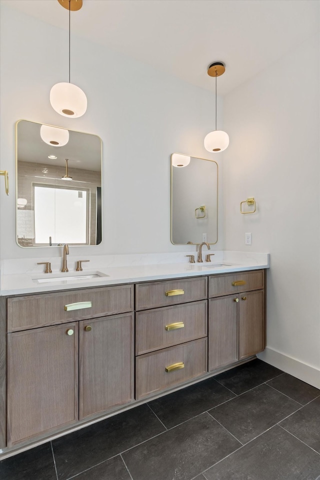 full bath featuring tile patterned flooring, a sink, and double vanity