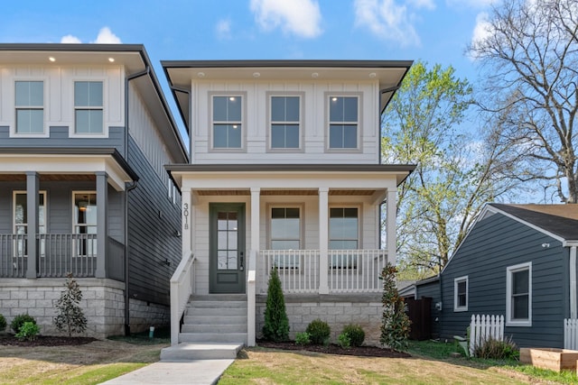 view of front of house featuring board and batten siding and a porch