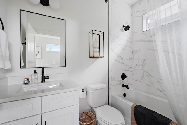 full bath featuring shower / bathtub combination with curtain, vanity, and toilet