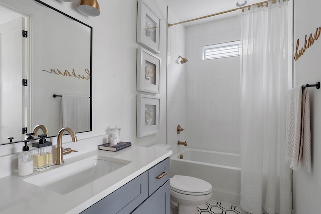 bathroom featuring shower / bath combo, toilet, and vanity
