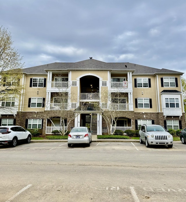 8211 Lenox Creekside Dr Unit 12, Antioch, TN 37013 - view of building exterior with uncovered parking