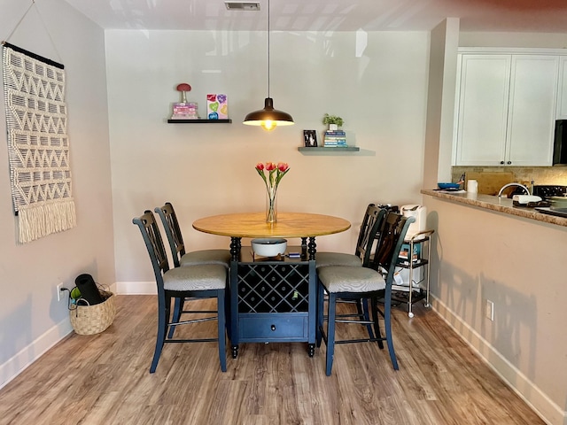 8211 Lenox Creekside Dr Unit 12, Antioch, TN 37013 - dining area featuring light wood-style floors, baseboards, and visible vents