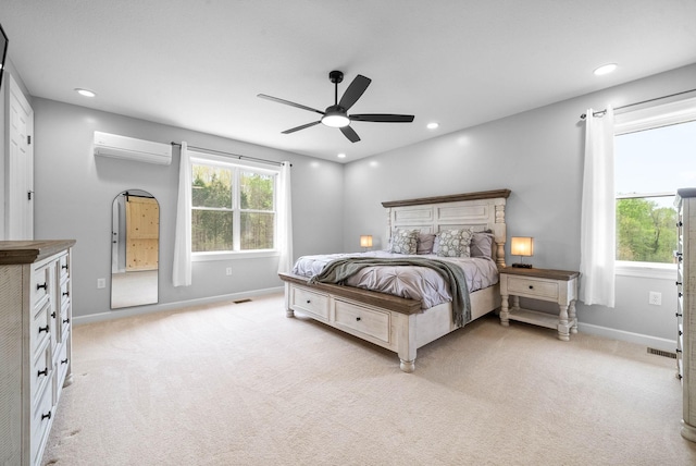 779 Iron Workers Rd W, Clarksville, TN 37043 - bedroom with light colored carpet, baseboards, and a wall mounted air conditioner