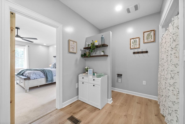 779 Iron Workers Rd W, Clarksville, TN 37043 - corridor with light wood-type flooring, baseboards, and visible vents