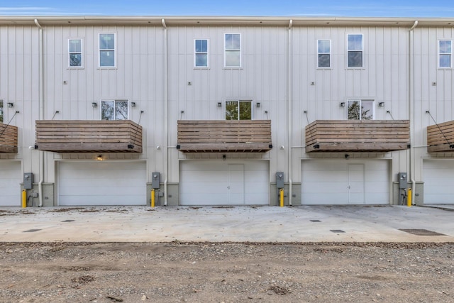 1617 Adams St, Chattanooga, TN 37408 - back of property with board and batten siding and an attached garage