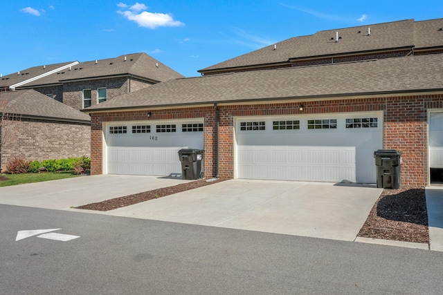 162 Jackson Alan Dr, Murfreesboro, TN 37130 - view of front of house with brick siding, roof with shingles, and driveway