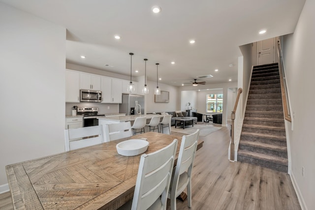 162 Jackson Alan Dr, Murfreesboro, TN 37130 - dining space with recessed lighting, stairway, light wood finished floors, and ceiling fan