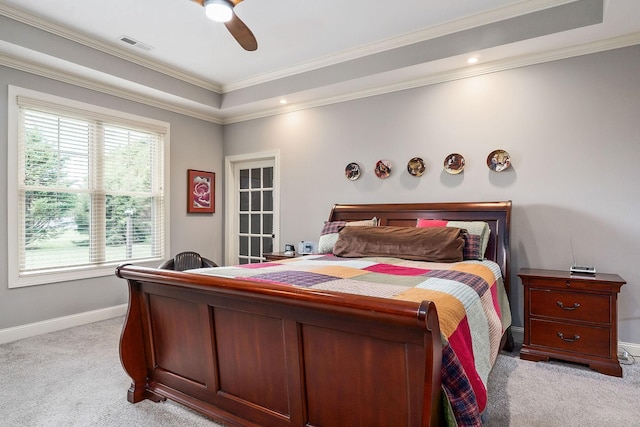 bedroom with carpet flooring, baseboards, ornamental molding, and visible vents