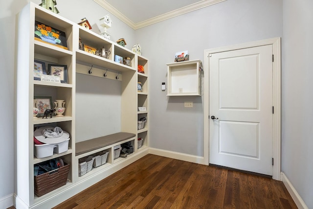 mudroom with crown molding, baseboards, and dark wood-style floors