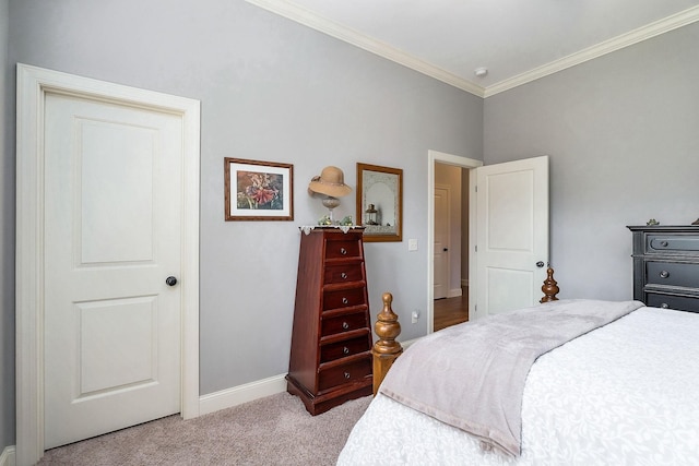 bedroom featuring ornamental molding, carpet floors, and baseboards