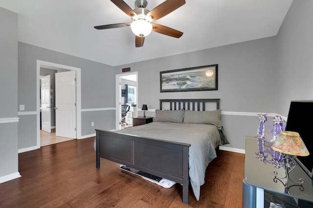 bedroom with baseboards, a ceiling fan, and wood finished floors