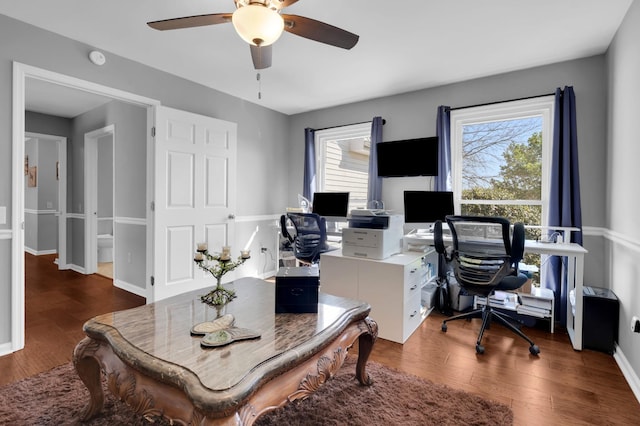 office space with a ceiling fan, plenty of natural light, and wood finished floors