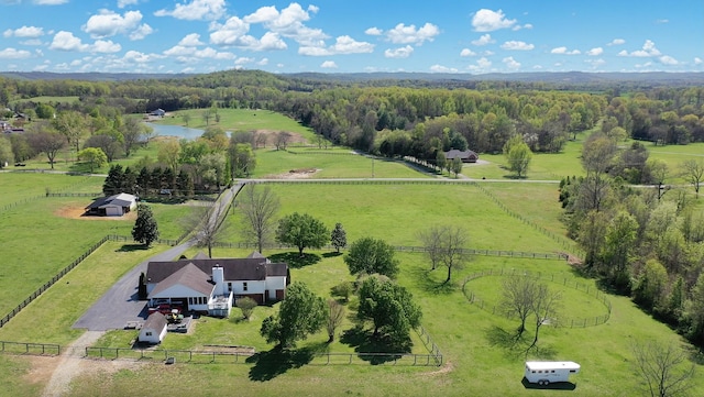 aerial view featuring a rural view and a water view