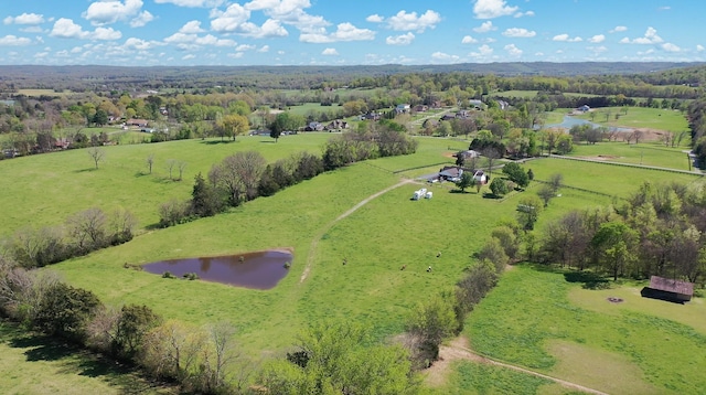aerial view with a rural view and a water view