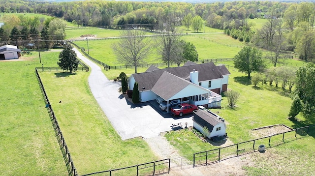 birds eye view of property featuring a rural view