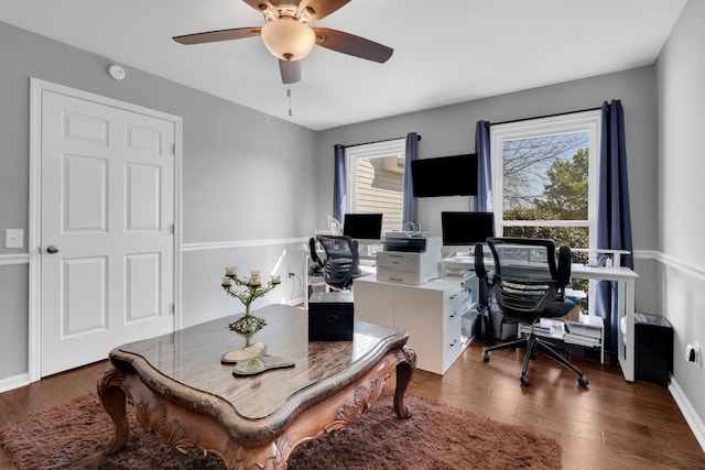 office area featuring a ceiling fan, plenty of natural light, and wood finished floors