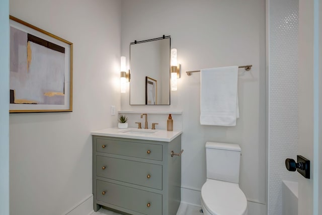 128 Alton Rd, Nashville, TN 37205 - bathroom featuring toilet, vanity, and baseboards