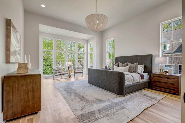 128 Alton Rd, Nashville, TN 37205 - bedroom featuring recessed lighting, an inviting chandelier, and wood finished floors