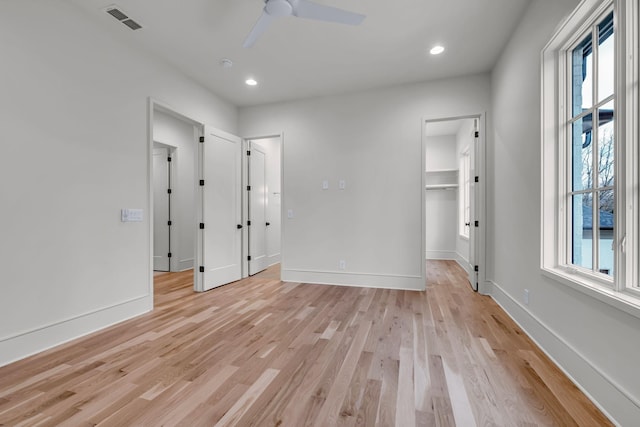 128 Alton Rd, Nashville, TN 37205 - unfurnished bedroom featuring visible vents, recessed lighting, multiple windows, and light wood-style floors
