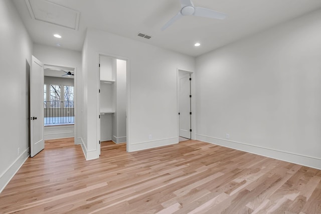 128 Alton Rd, Nashville, TN 37205 - unfurnished bedroom featuring baseboards, recessed lighting, a walk in closet, visible vents, and light wood finished floors