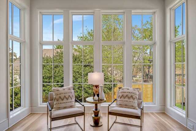 128 Alton Rd, Nashville, TN 37205 - sunroom featuring baseboards, wood finished floors, and a healthy amount of sunlight