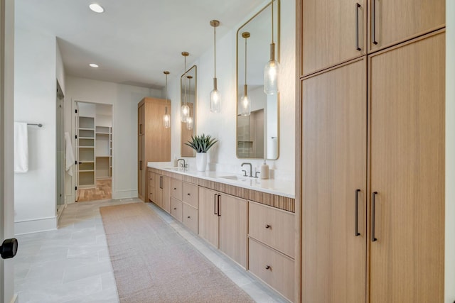 128 Alton Rd, Nashville, TN 37205 - full bathroom with a sink, a walk in closet, double vanity, and recessed lighting