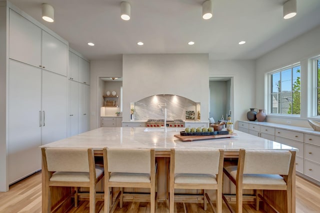 128 Alton Rd, Nashville, TN 37205 - kitchen featuring recessed lighting, light wood-style flooring, and modern cabinets