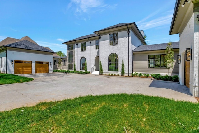 128 Alton Rd, Nashville, TN 37205 - view of front of house featuring a garage and concrete driveway