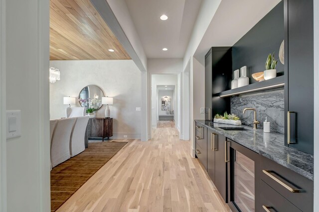 128 Alton Rd, Nashville, TN 37205 - corridor with recessed lighting, a sink, beverage cooler, light wood finished floors, and baseboards
