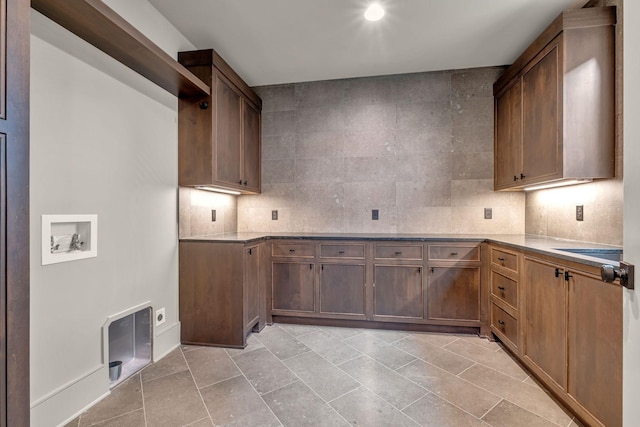 128 Alton Rd, Nashville, TN 37205 - laundry room featuring electric dryer hookup, hookup for a washing machine, and cabinet space